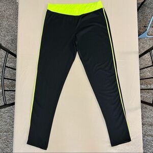 Love nation lime green and black leggings in a size medium/large
